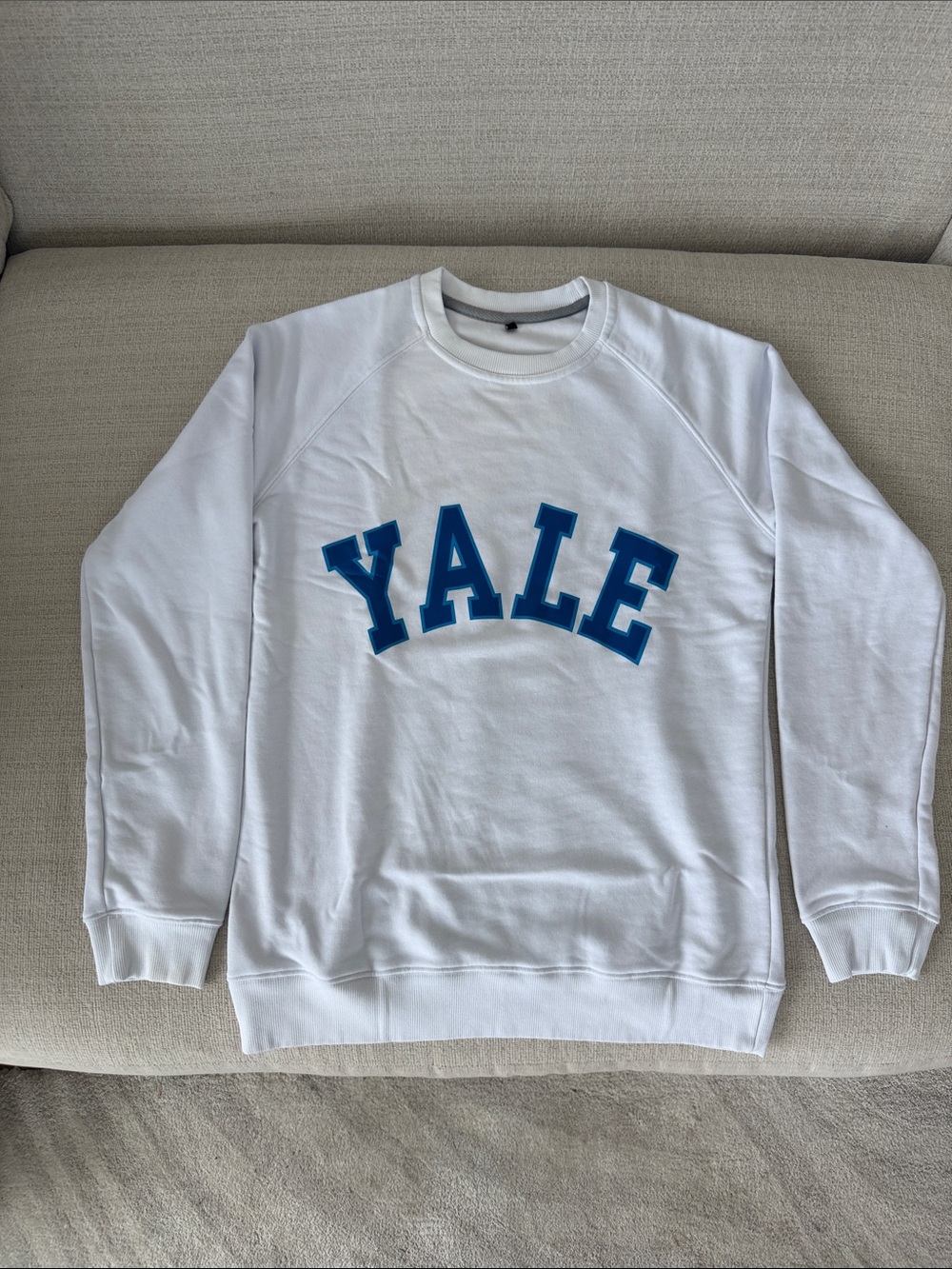 White Crewneck Sweatshirt with Blue YALE Lettering